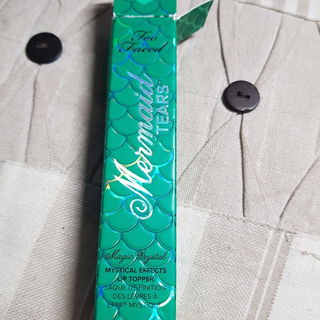 Life's a Festival - Magic Crystal Transforming Lip Topper - Too Faced